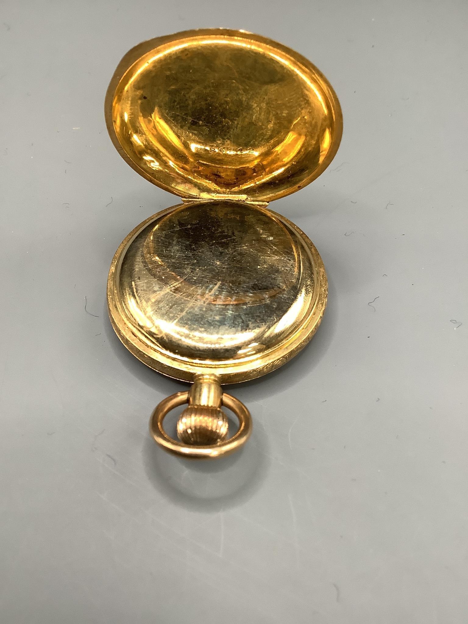 An early 20th century engraved 18k Waltham hunter fob watch, case diameter 34mm, gross weight, 34.9 grams.